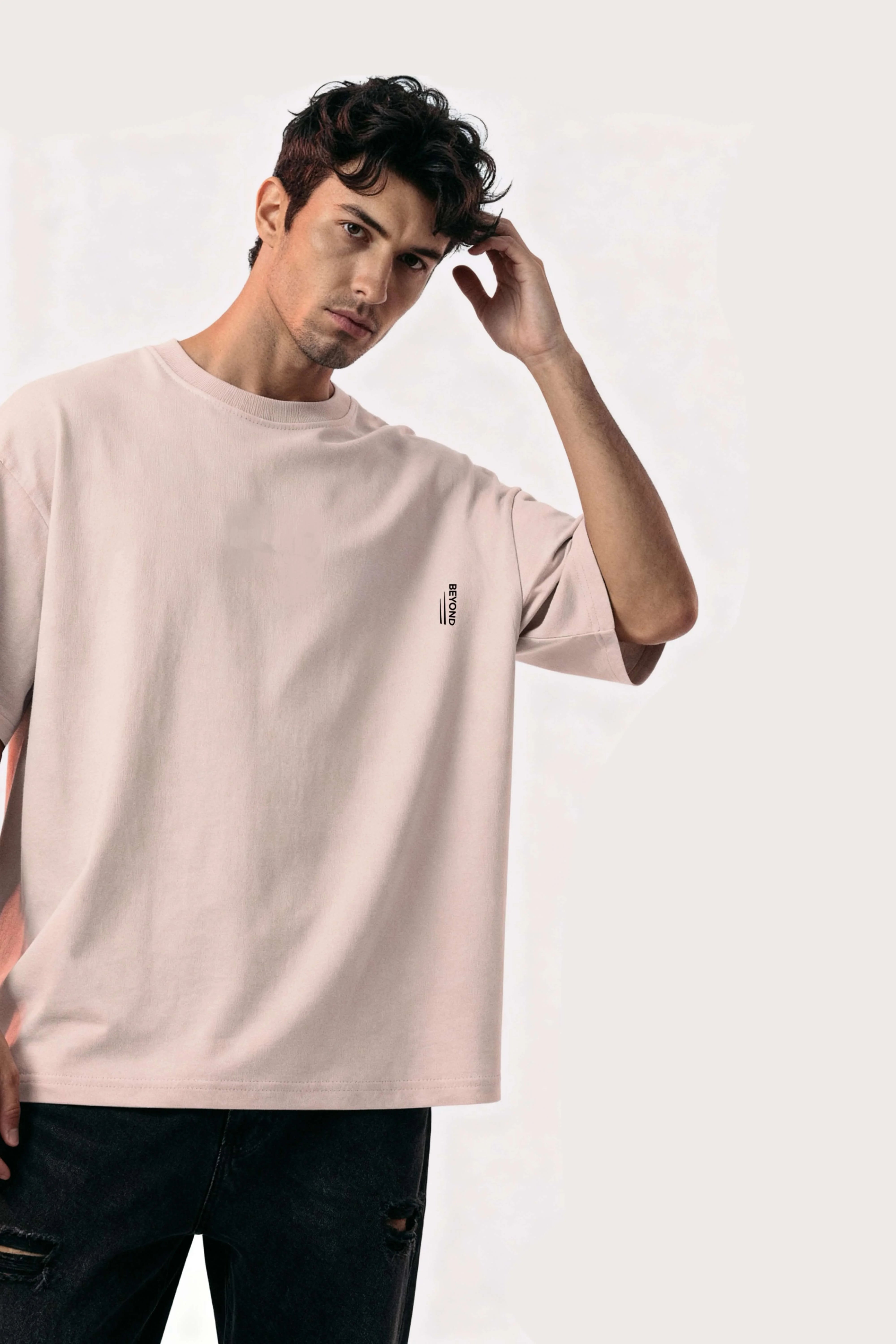 Men-oversized-beige-tshirt-beyond-logo