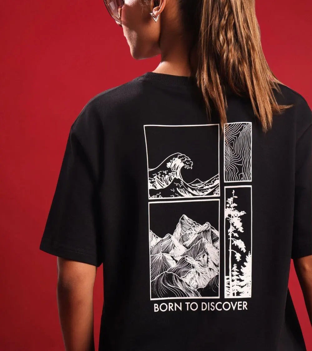 woman wearing born to discover black oversized t-shirt