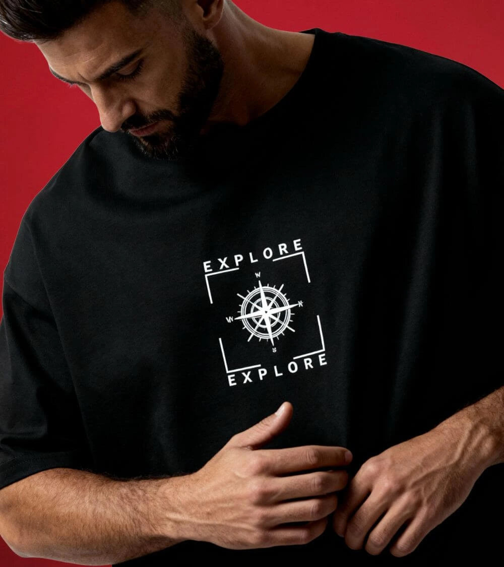a man wearing black oversized t-shirt explore fit
