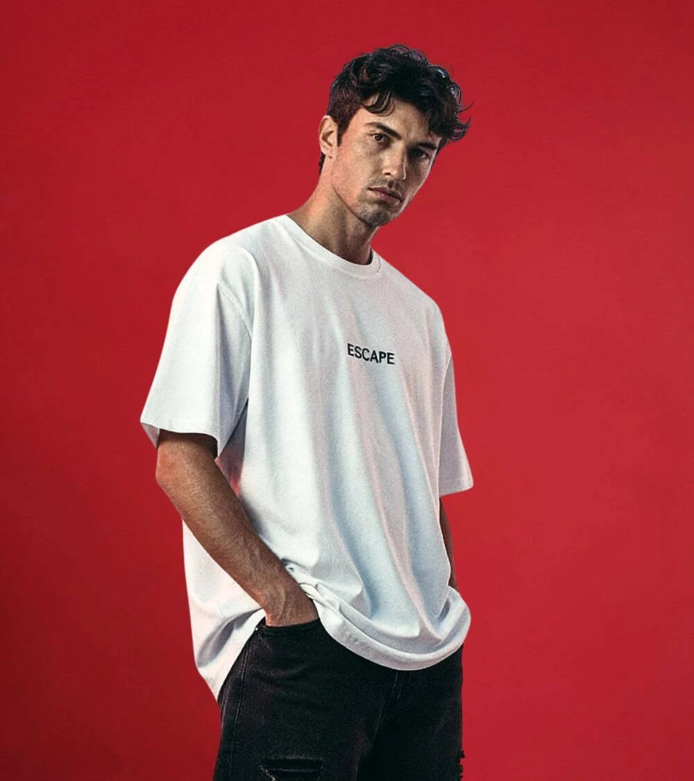man wearing white oversized t-shirt