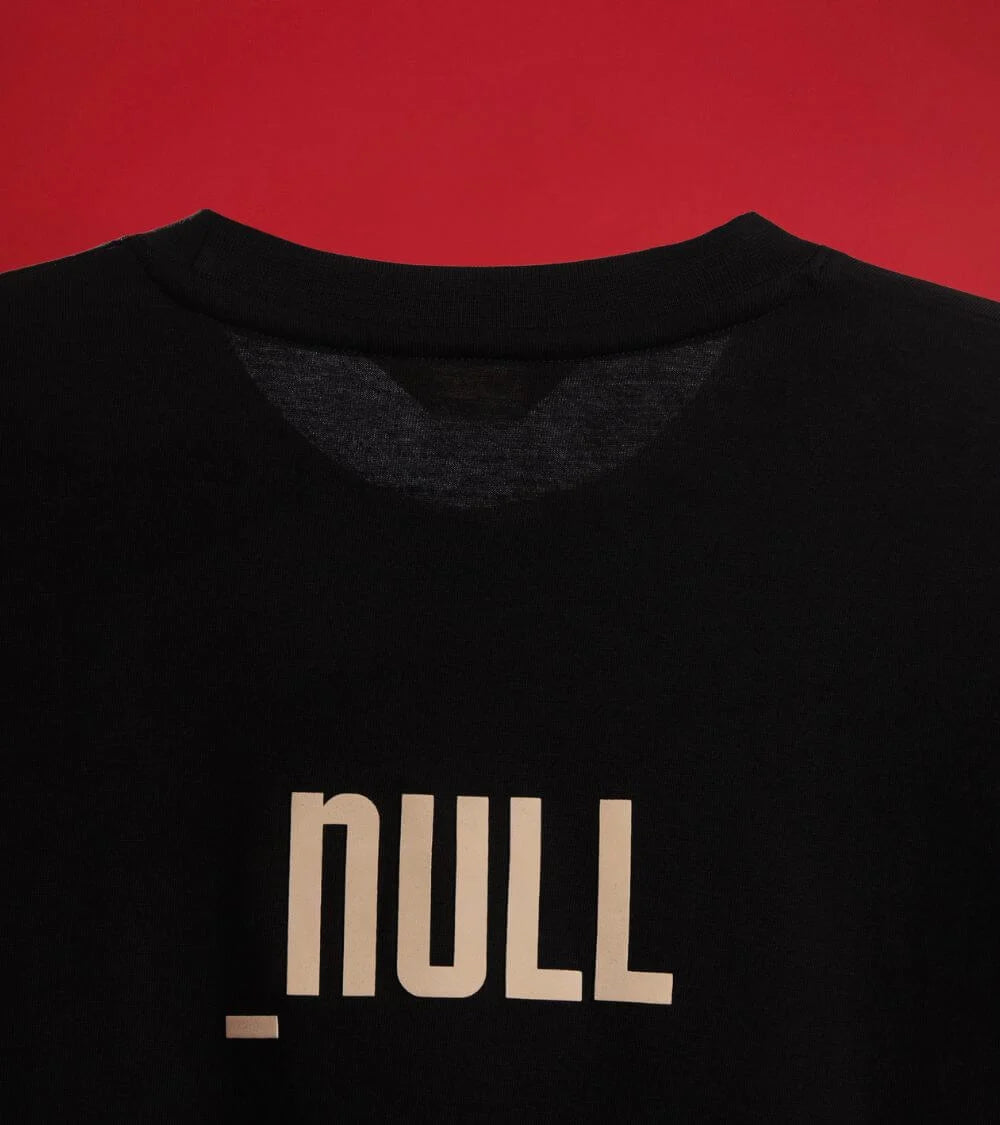man wearing black relaxed fit null high definition t-shirt