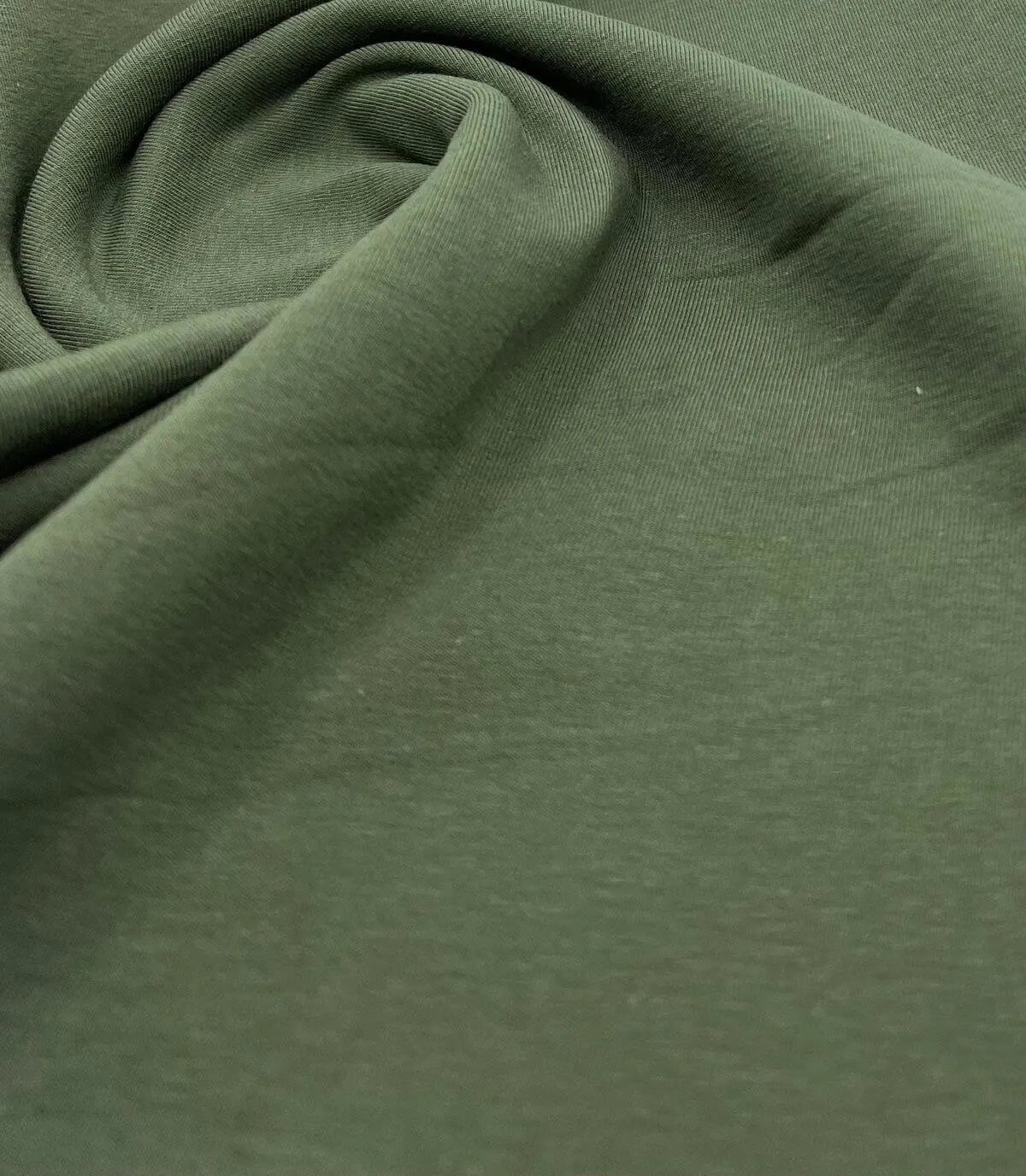green t-shirt fabric close look