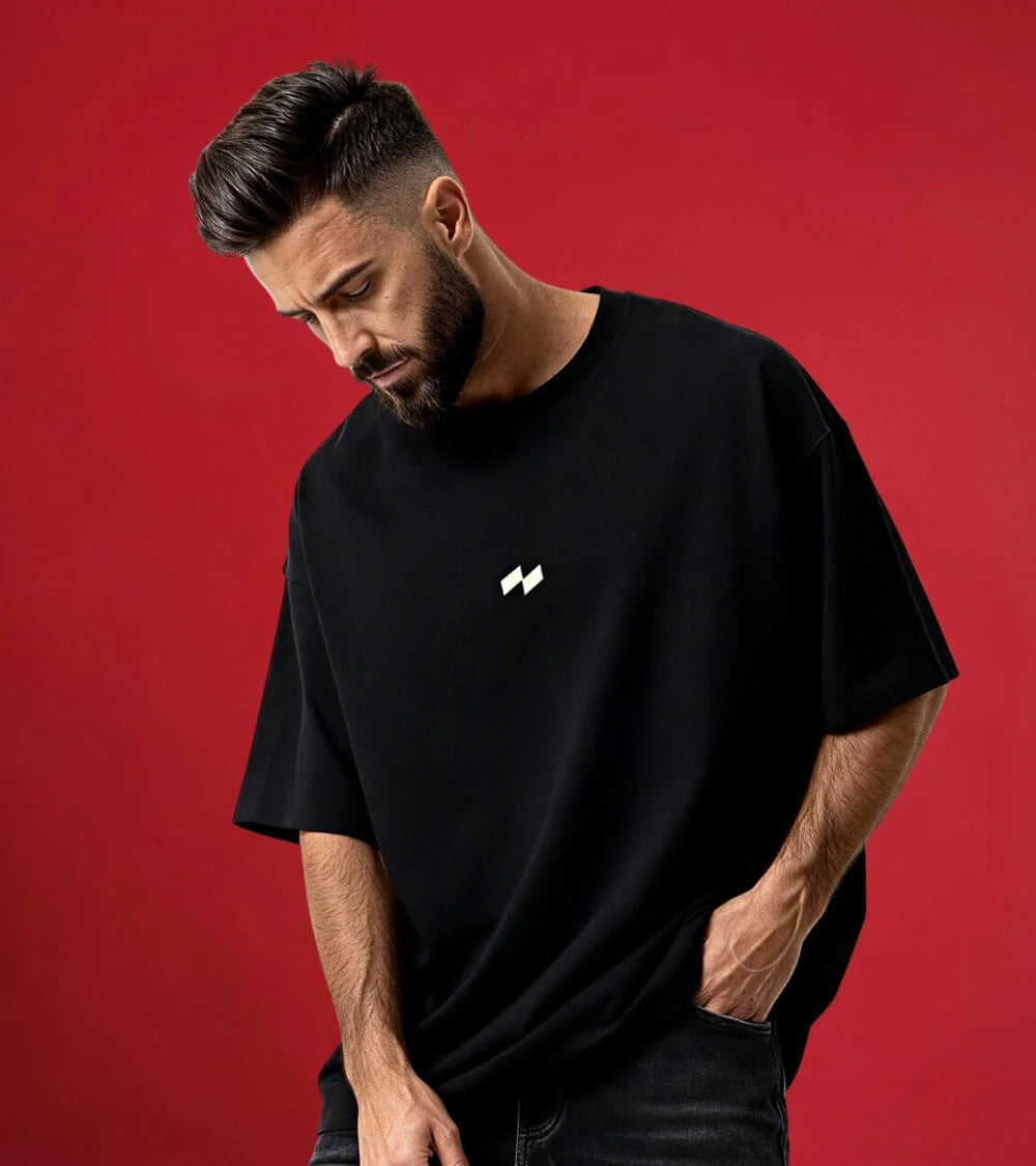 man wearing black relaxed fit null high definition t-shirt