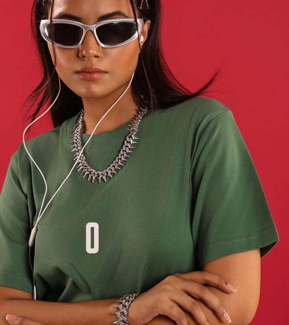 woman wearing green relaxed fit t-shirt